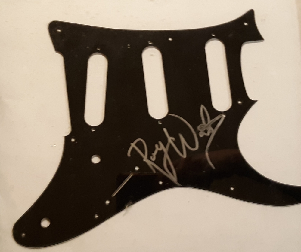 Autographed pick guard from Roger Waters